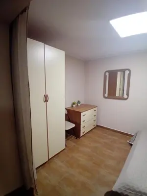 Letto o letti in una camera di Casa Alessia
