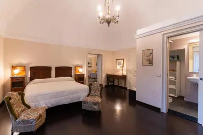 Letto o letti in una camera di Casa Arezzo al Duomo