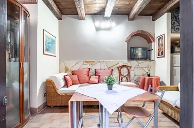Area soggiorno di GuestHost - Castello Ursino Apartment with Balcony