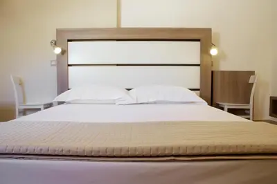 Letto o letti in una camera di Antico Convento Dei Cappuccini