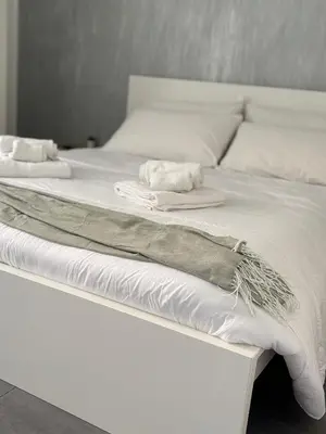 Letto o letti in una camera di Dionisio Apartments