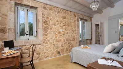 Letto o letti in una camera di PALMENTO SAN LORENZO 6, Emma Villas