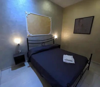 Letto o letti in una camera di Hotel Gorizia