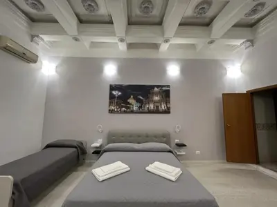 Letto o letti in una camera di Hotel Gorizia