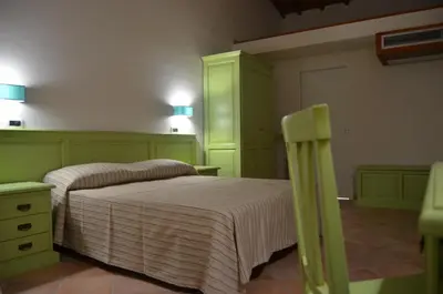 Letto o letti in una camera di B&B Al Tramonto Portopalo