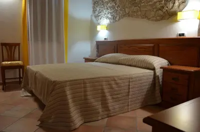 Letto o letti in una camera di B&B Al Tramonto Portopalo