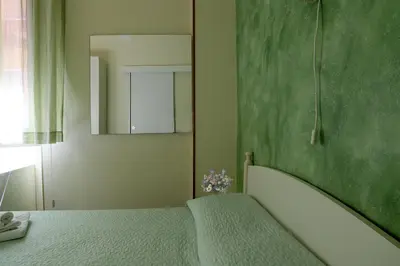 Letto o letti in una camera di Night & Day
