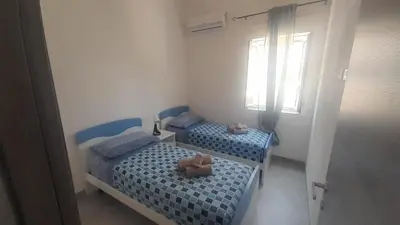 Letto o letti in una camera di Casa vacanza Samarcanda
