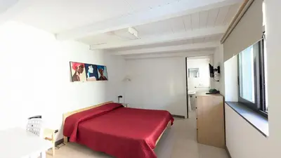 Letto o letti in una camera di Loft Vicolo Lavico