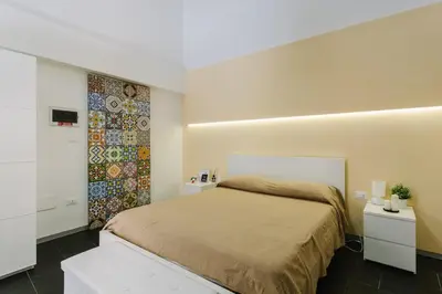 Letto o letti in una camera di 1743 Loft