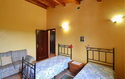 Letto o letti in una camera di Villa Eureka
