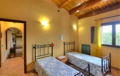 Letto o letti in una camera di Villa Eureka