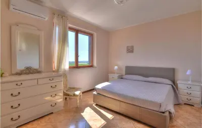 Letto o letti in una camera di Smeraldo