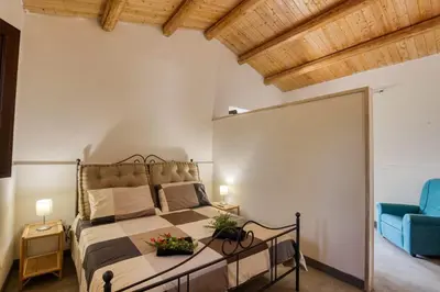 Letto o letti in una camera di Relais Casa Bonivini - Scirocco