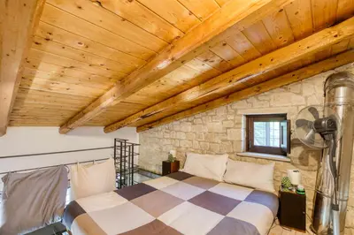 Letto o letti in una camera di Relais Casa Bonivini - Maestrale