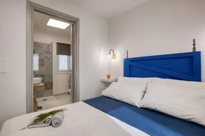 Letto o letti in una camera di Relais Casa Bonivini - Grecale