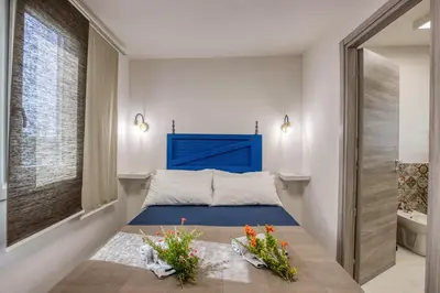 Letto o letti in una camera di Relais Casa Bonivini - Libeccio