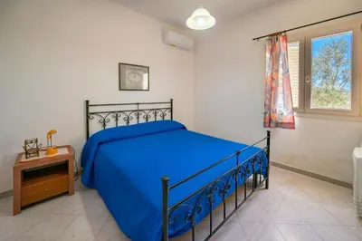Letto o letti in una camera di Casa Luciano