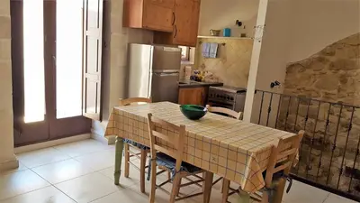Cucina o angolo cottura di Casa Vacanze Antica Ibla