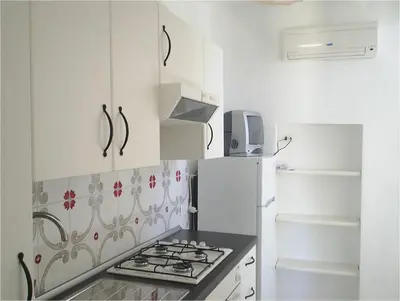 Cucina o angolo cottura di Casa Vacanze Antica Ibla