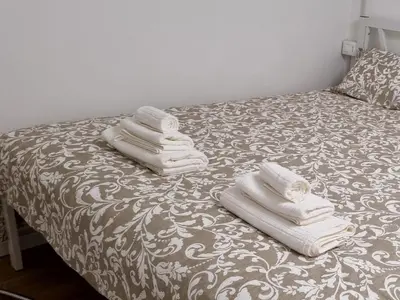 Letto o letti in una camera di Οίκος εω Apartment City Center