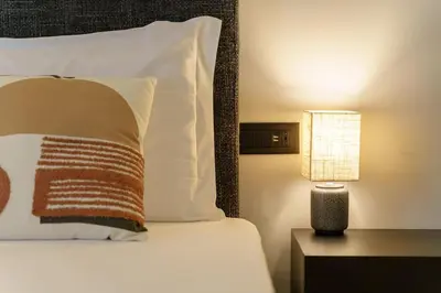 Letto o letti in una camera di Appartamento Domus Lavica