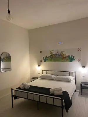 Letto o letti in una camera di La Casa di Rinaldo