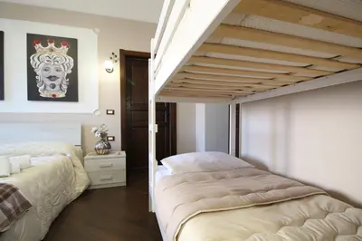 Letto o letti in una camera di Casa 4 Archi