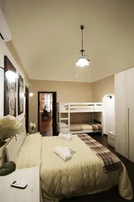 Letto o letti in una camera di Casa 4 Archi