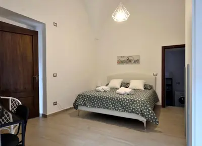 Letto o letti in una camera di la casa di carta al duomo