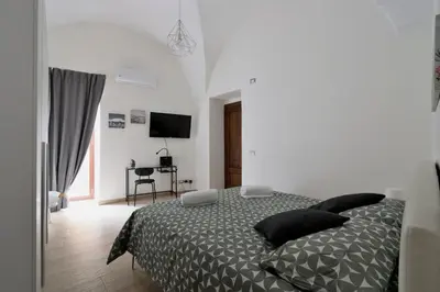 Letto o letti in una camera di la casa di carta al duomo