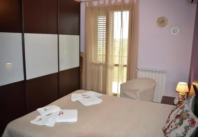 Letto o letti in una camera di Baazar House