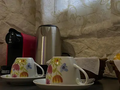 Set per la preparazione di tè e caffè presso Pittà Room Suite & Private SPA