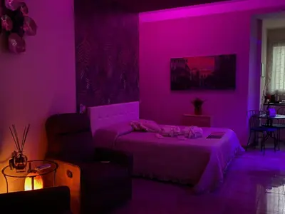 Letto o letti in una camera di Pittà Room Suite & Private SPA