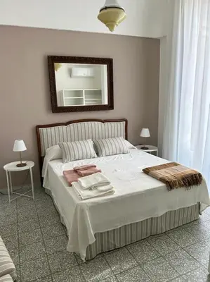 Letto o letti in una camera di Casa D'Amico al Duomo