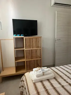 Letto o letti in una camera di White home Marzamemi