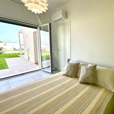 Letto o letti in una camera di Villa Zefiro tra Piscina e Mare