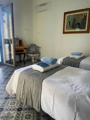 Letto o letti in una camera di Farfalla Blu