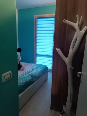 Letto o letti in una camera di Residence Calazzurra Noto
