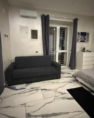 Letto o letti in una camera di Naomi Luxury Home
