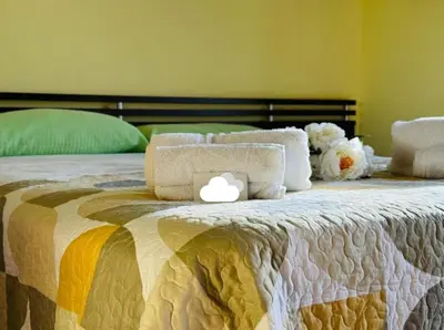 Letto o letti in una camera di Casa Orchidea Altera
