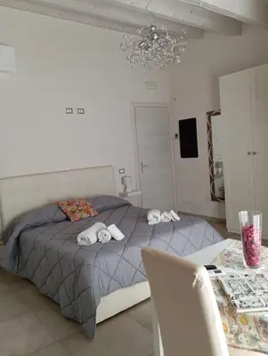 Letto o letti in una camera di New Aurispa
