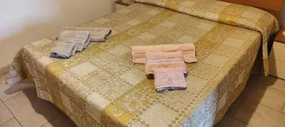 Letto o letti in una camera di Casa Verga Ispica