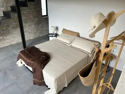 Letto o letti in una camera di Villa Calimma