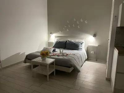 Letto o letti in una camera di I sogni di LUDO open space