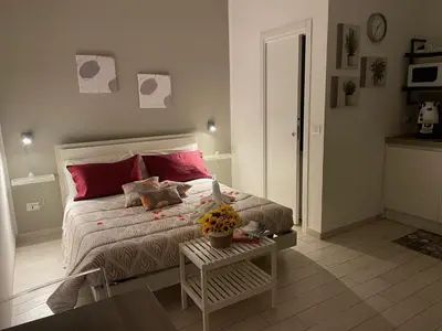 Letto o letti in una camera di I sogni di LUDO open space