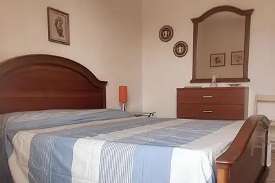 Letto o letti in una camera di Holiday House Casa Vacanze Vento di Mare