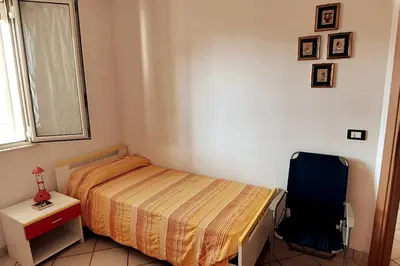 Letto o letti in una camera di Holiday House Casa Vacanze Vento di Mare