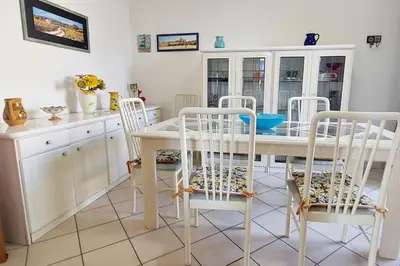 Cucina o angolo cottura di Holiday House Casa Vacanze Vento di Mare