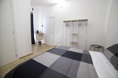 Letto o letti in una camera di Residence Le Tre Piazze